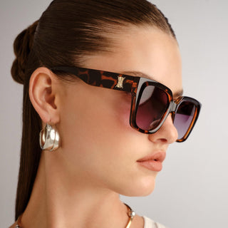 Le Specs Illusion Sunglasses, Tort